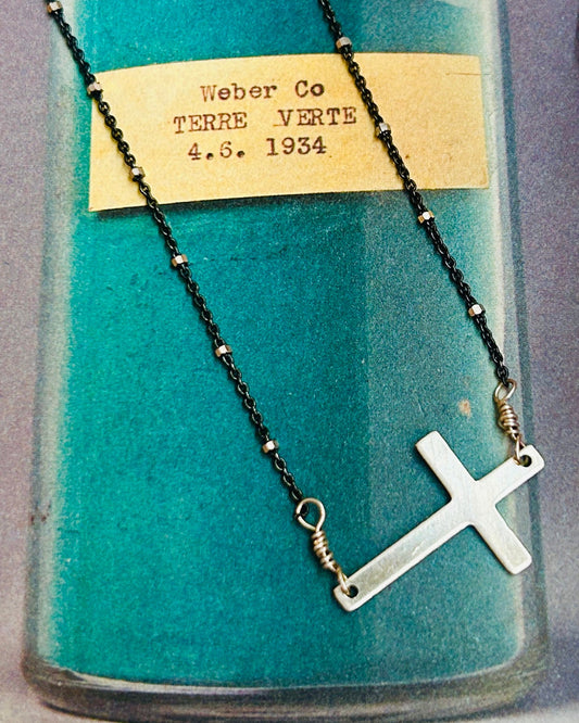 Oxidized Satellite Chain with Cross