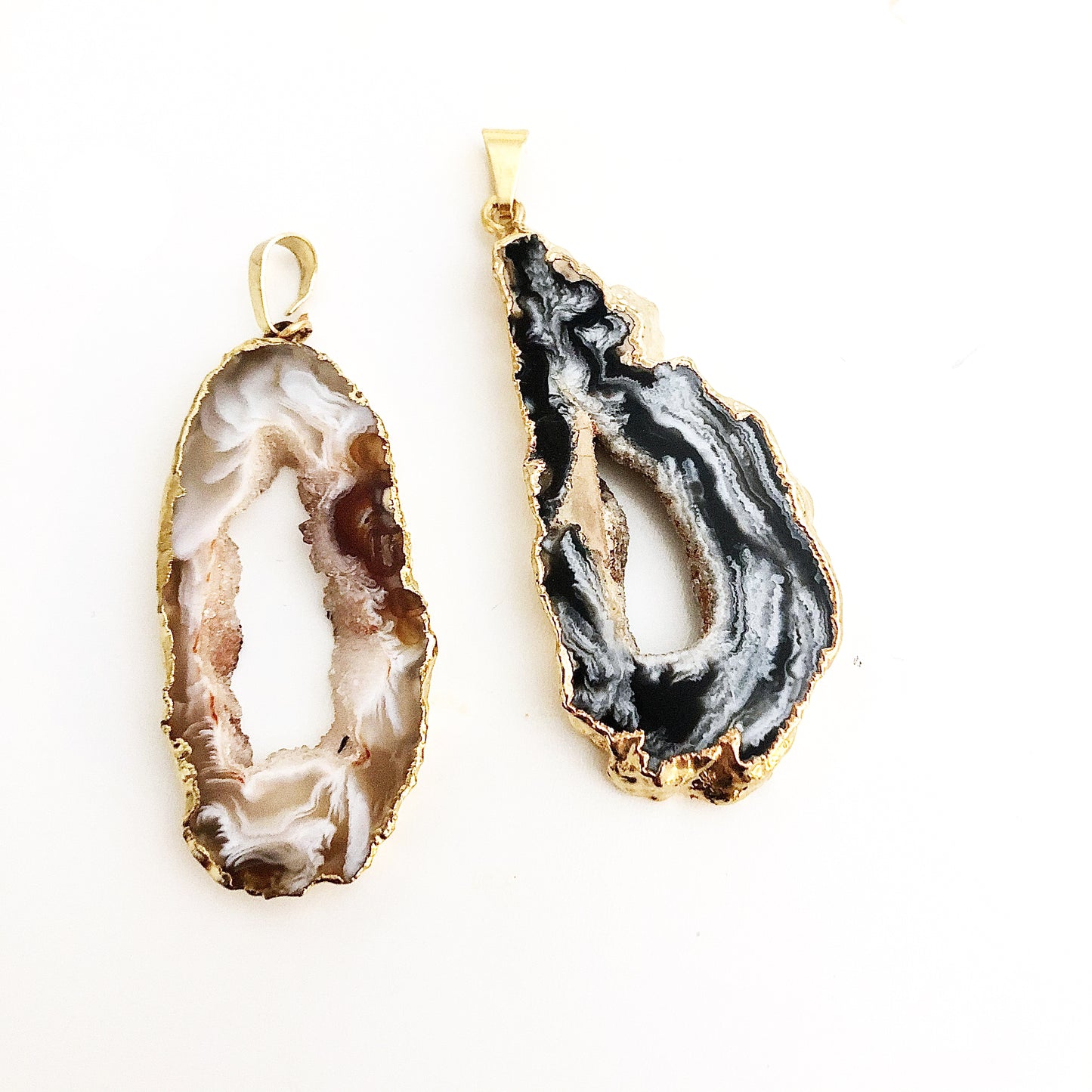 Two Geode Sliced pendants with Gold plated edge
