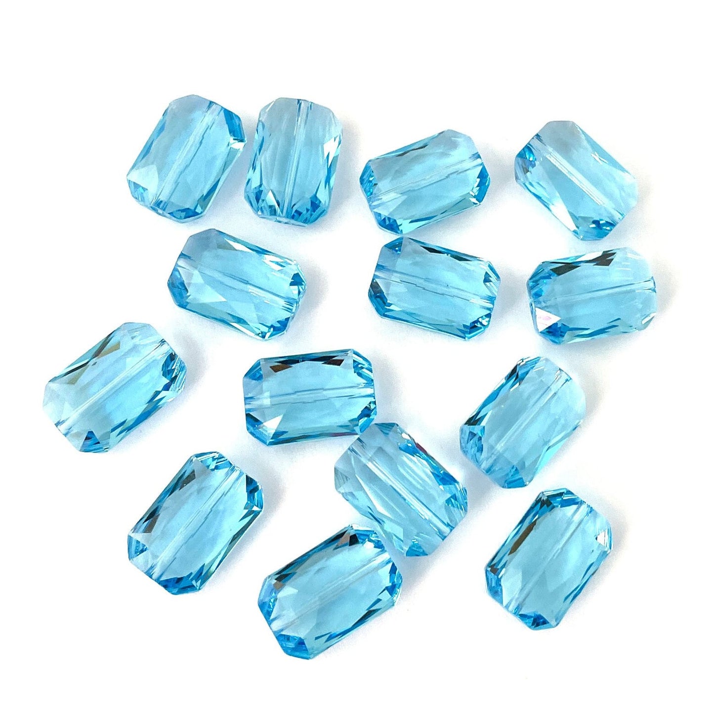 7 pieces of 14mm Aquamarine 5515 Emerald Cut Swarovski